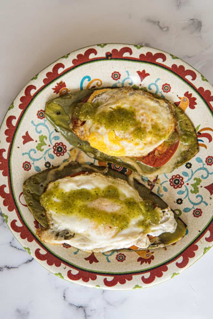 This Nopales and Eggs Recipe is made with oil, cactus paddles, tomatoes, salsa verde, and eggs anyway you want them.