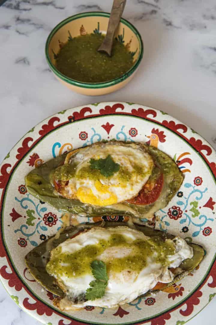 This Nopales and Eggs Recipe is made with oil, cactus paddles, tomatoes, salsa verde, and eggs anyway you want them.