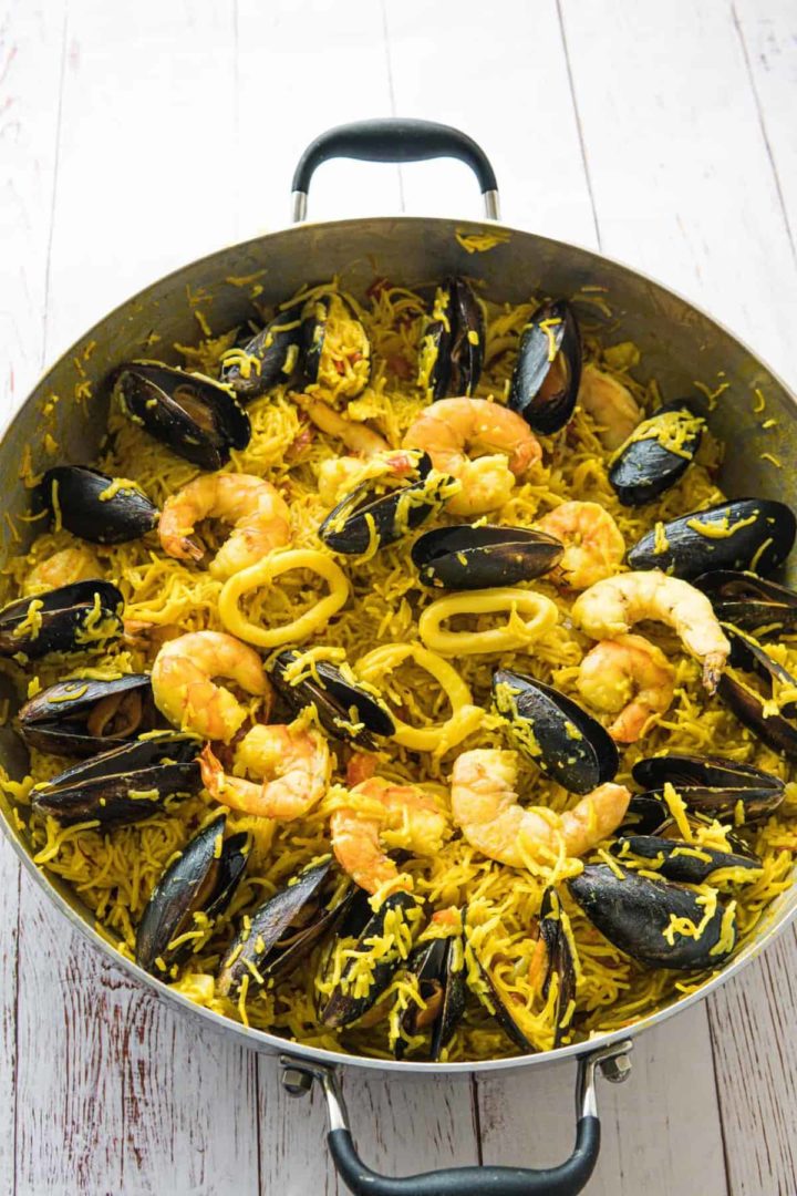 This Pasta Paella dish is simple and It is made using fideos, squids, shrimp, mussels, and nutritious vegetables.