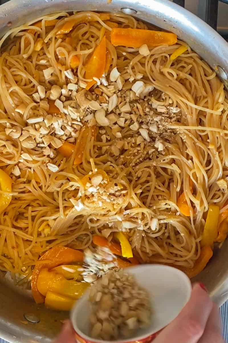 Add the cooked noodles to the skillet and pour the sauce over the top. Toss everything together until the noodles are coated in the sauce. Cook for an additional 2-3 minutes, stirring frequently, until the noodles are heated through and the sauce has thickened slightly.
