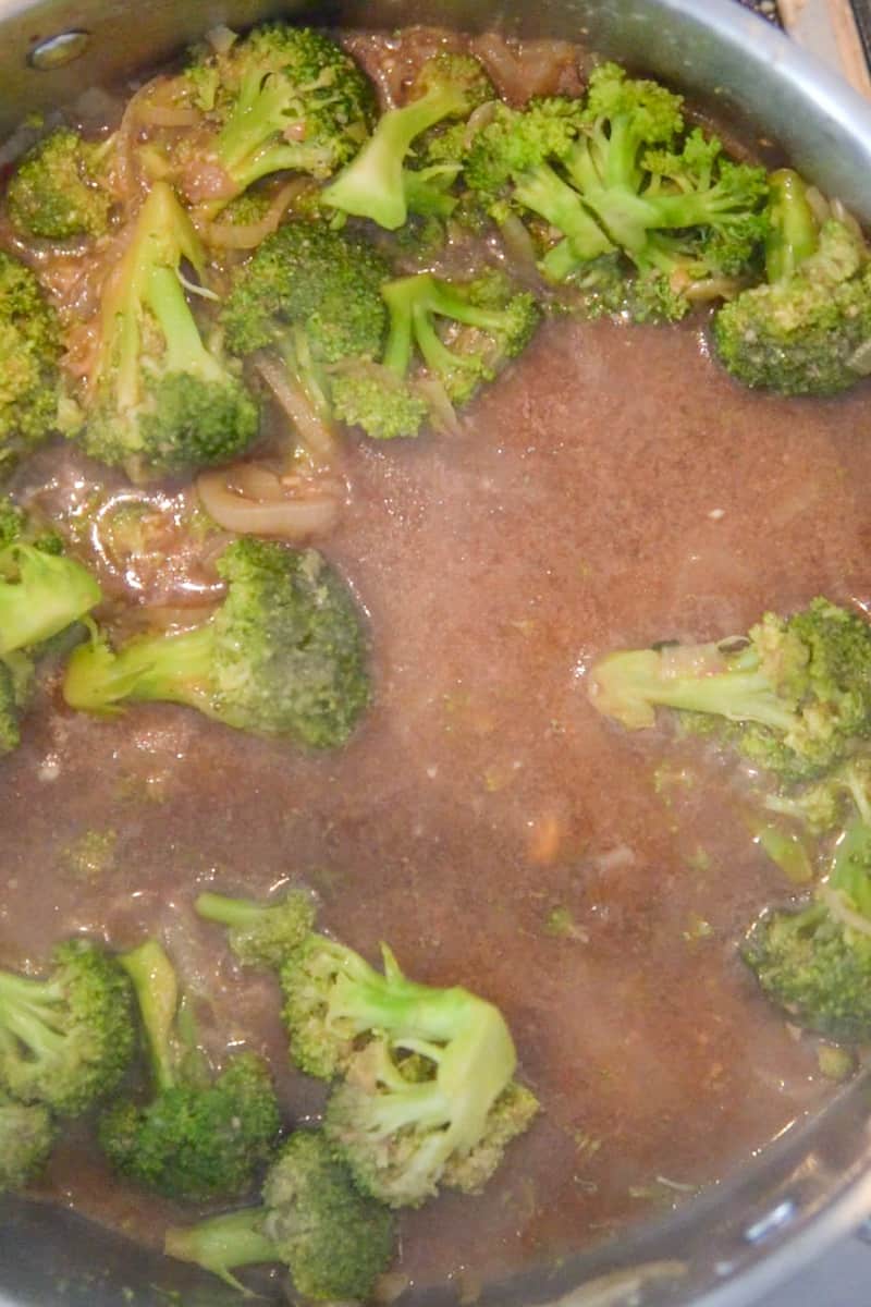 Reserve the marinade. Add broth and corn starch into the marinade mixture and mix. Wipe the skillet clean. On medium heat, add and heat up oil. Stir in the broccoli and onion. Cook the vegetables until the broccoli is tender, about 5 minutes.