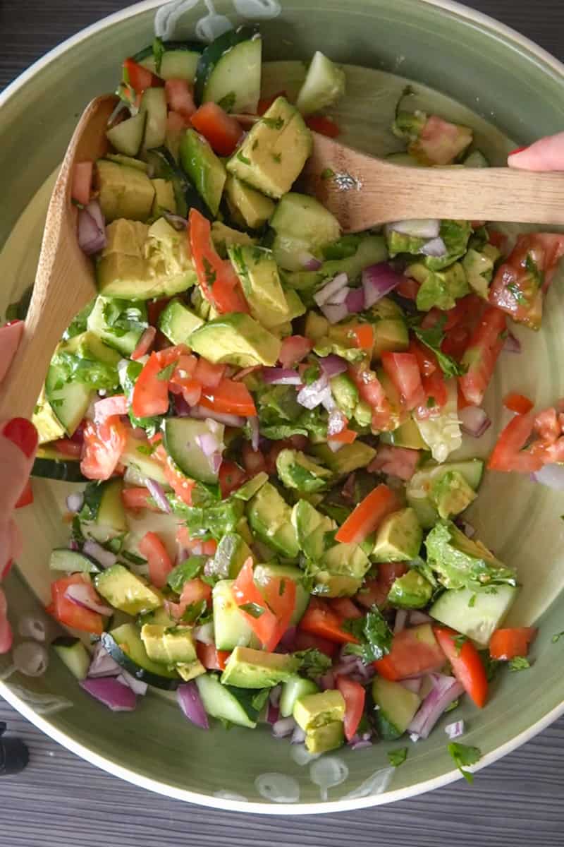 Pour the dressing over the salad and toss gently to combine.