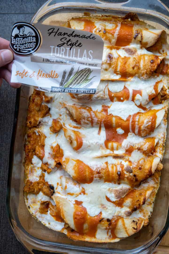 These Buffalo Chicken Enchiladas with Ranch are made with corn tortillas, shredded chicken, buffalo sauce, ranch dressing and mozzarella cheese.
