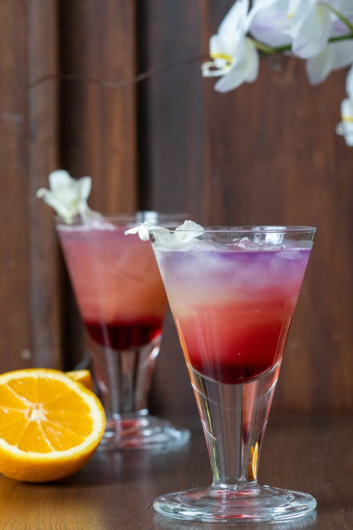 This Gin and Juice Drink is made with gin, orange juice, and grenadine syrup and is pour into a glass of ice and stirred into a cocktail.
