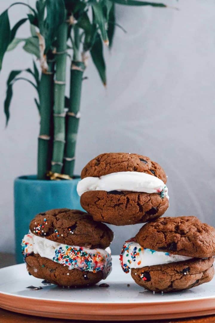 Add the sprinkles on the plate and roll the ice cream edges in the sprinkles. Eat sandwich immediately or individually wrap them in plastic wrap and place in a freezer bag and freeze them.  