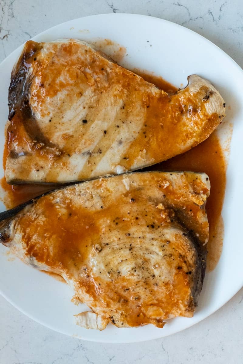 Remove the swordfish from the grill and add on a plate. Finish with a splash of fresh lemon juice. Enjoy this Swordfish Steak Recipe.