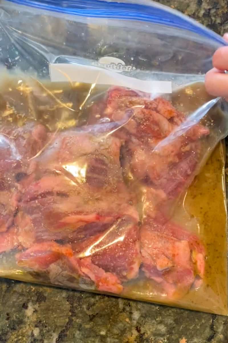 Marinate the meat. Sprinkle meat seasoning, garlic salt all over the skirt steak. Add the steak in a large Ziplock bag, and pour in the mojo marinade. Place the marinated steak in fridge and refrigerate for at least 1 hour. For best results, marinate overnight.