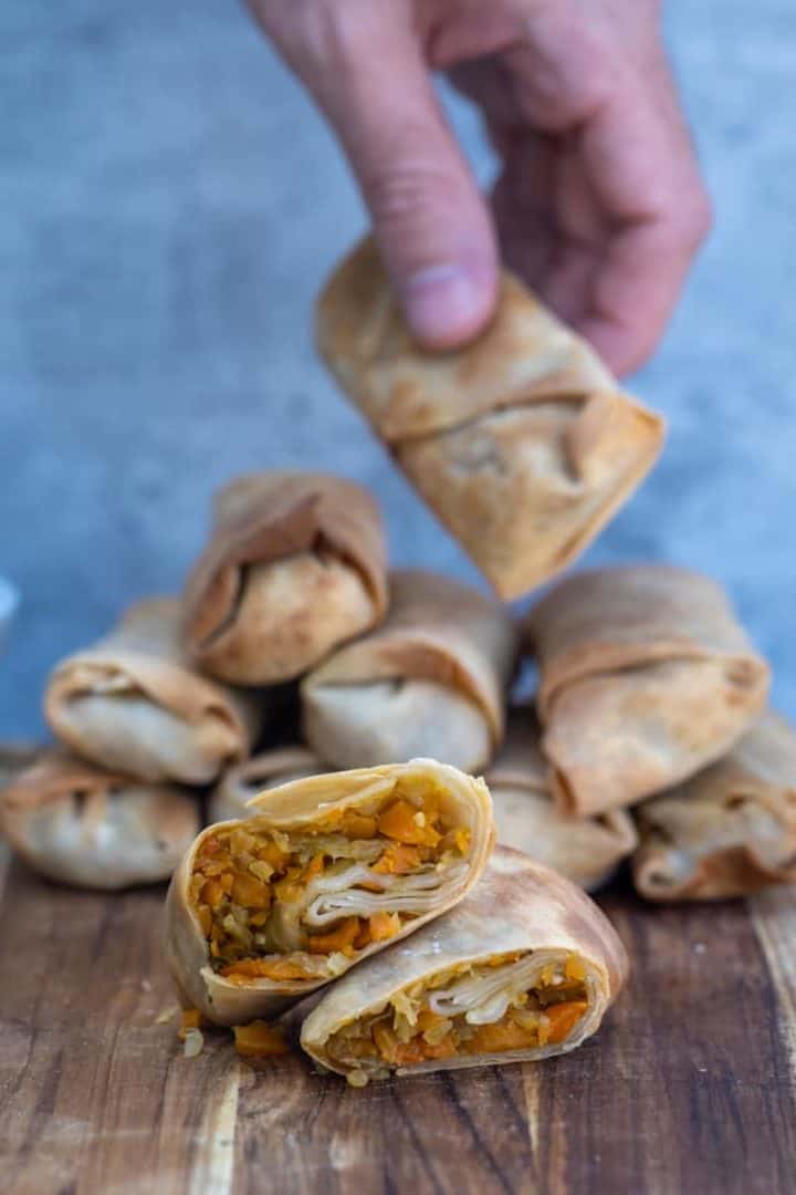 This Air Fryer Egg Rolls Recipe is made with egg roll wrappers, cabbage, carrots, garlic and ginger and air fried to perfection.