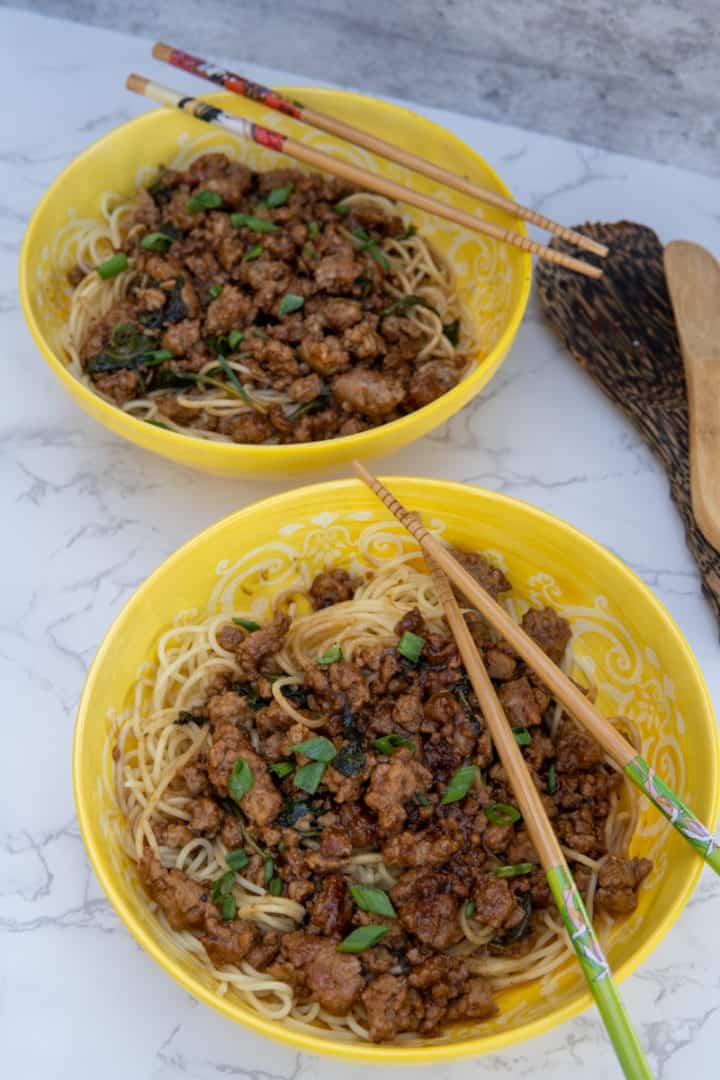 These Beef Szechuan Noodles are made with Chinese egg noodles, ground pork, soy sauce, hoisin sauce, rice vinegar, and Szechuan chili oil.