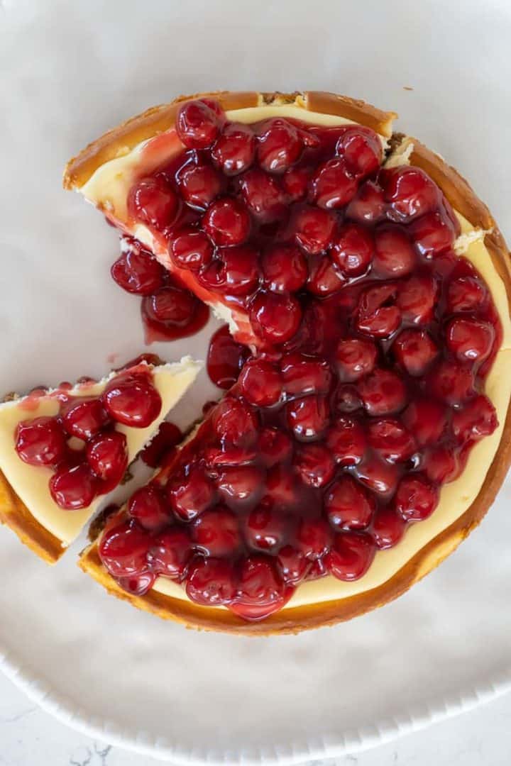 Top cheesecake with Cherry pie filling. Enjoy this New York Cheesecake Recipe.