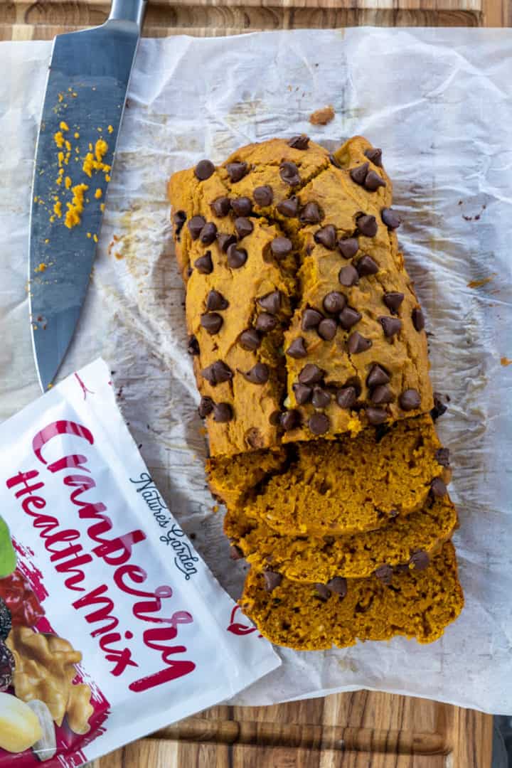 This Pumpkin Bread Recipe is made with flour, pumpkin puree, cinnamon, butter, sugar, nuts, milk, vanilla, and chocolate.