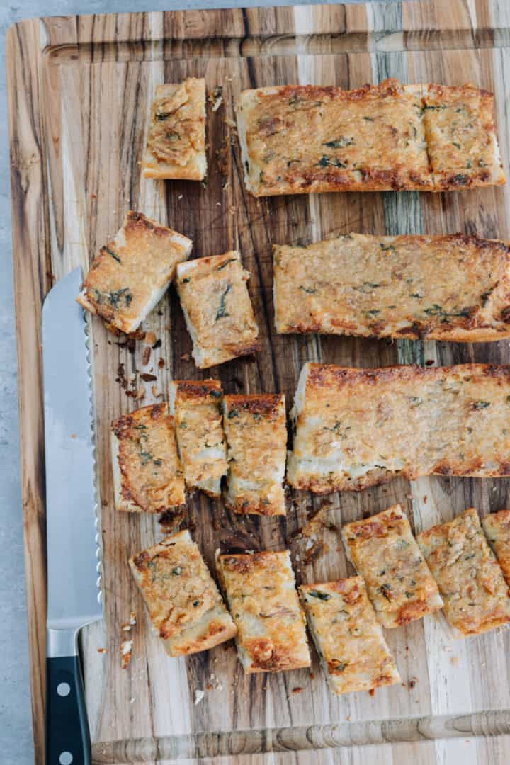 Place bread in the oven for 15 minutes, until golden and crispy. Enjoy this Artisan Roasted Garlic Bread with Baguette. 