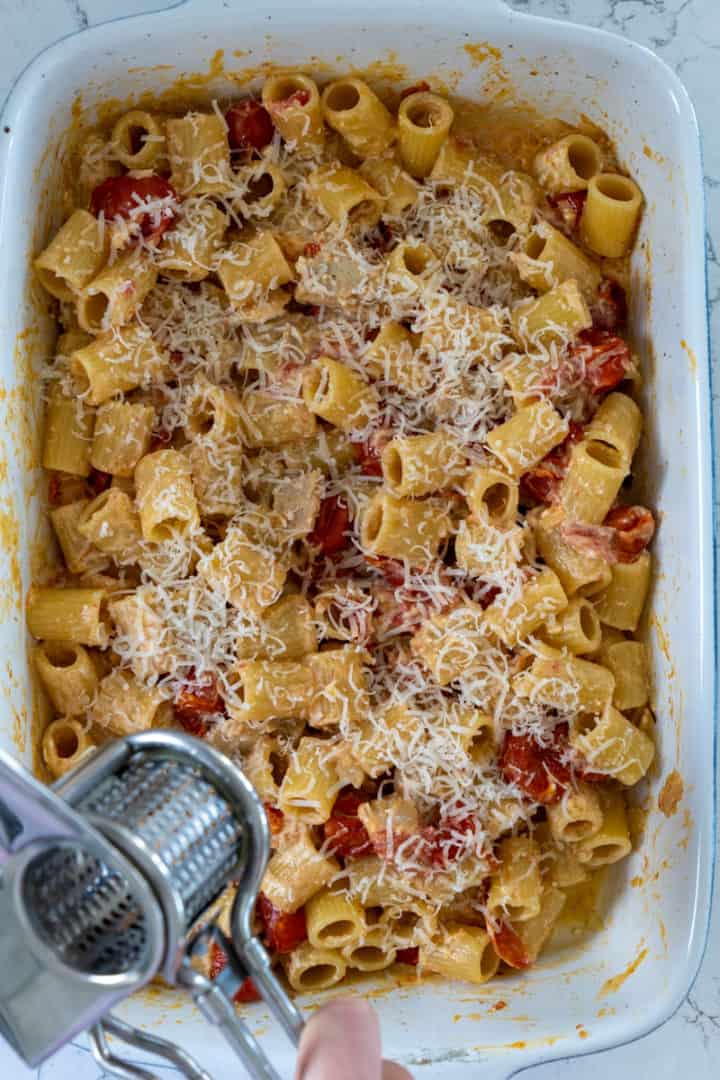 This Tuna Pasta Bake Recipe with Feta is made with feta cheese, cherry tomatoes, shallots, garlic, lemon zest, tuna, and rigatoni pasta.