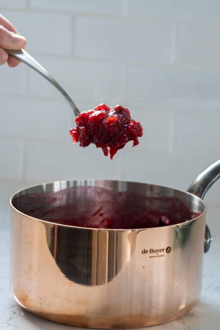How to make Cranberry Sauce Recipe (Vegan and Gluten Free) is so easy – all you need are three ingredients and it only takes ten minutes to make.