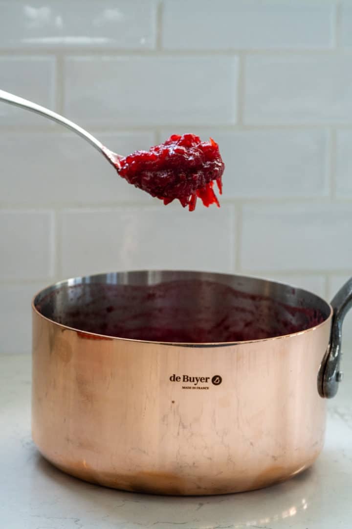 This Cranberry Sauce Recipe is so easy – all you need are three ingredients and it only takes ten minutes to make.