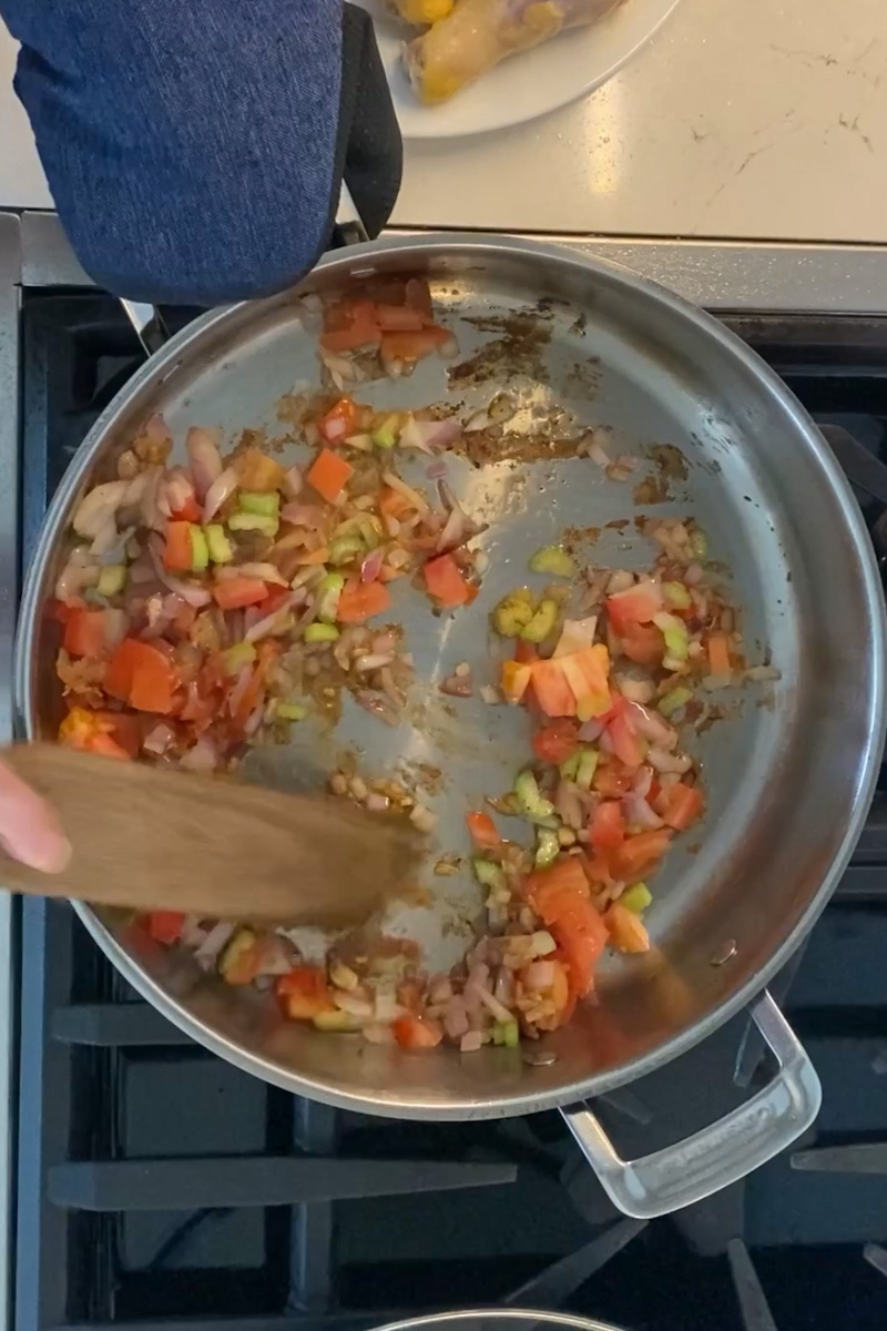 In the same pan, add more oil if needed. Add the onion, garlic, celery and salt and cook for 4 minutes. Add the diced tomato, oregano, chicken broth and salt and pepper.