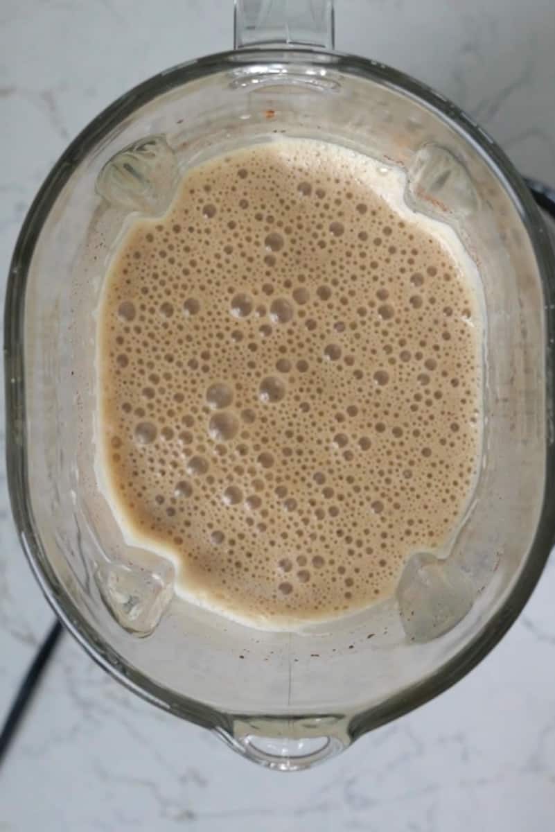 Put the almond milk, bananas, maple syrup, cinnamon, and vanilla in a blender and process until smooth.