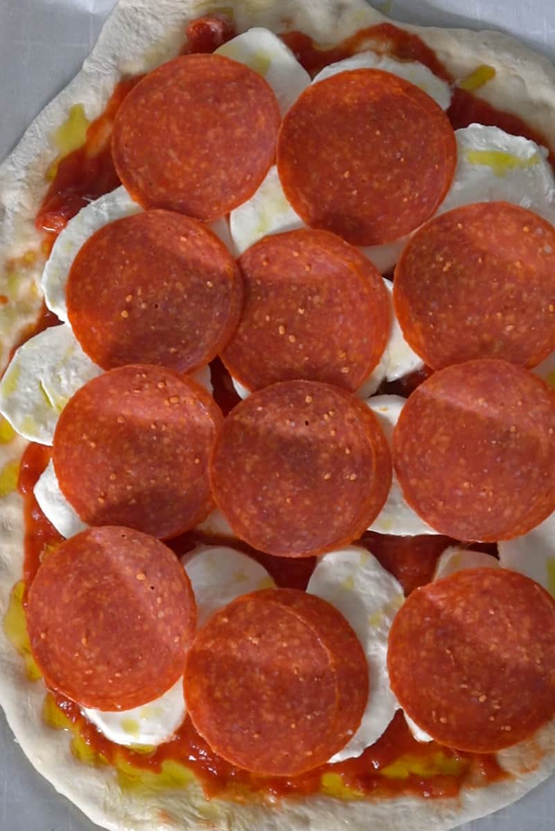 Finally add the pepperoni. Put in the oven for about 15 minutes. 
