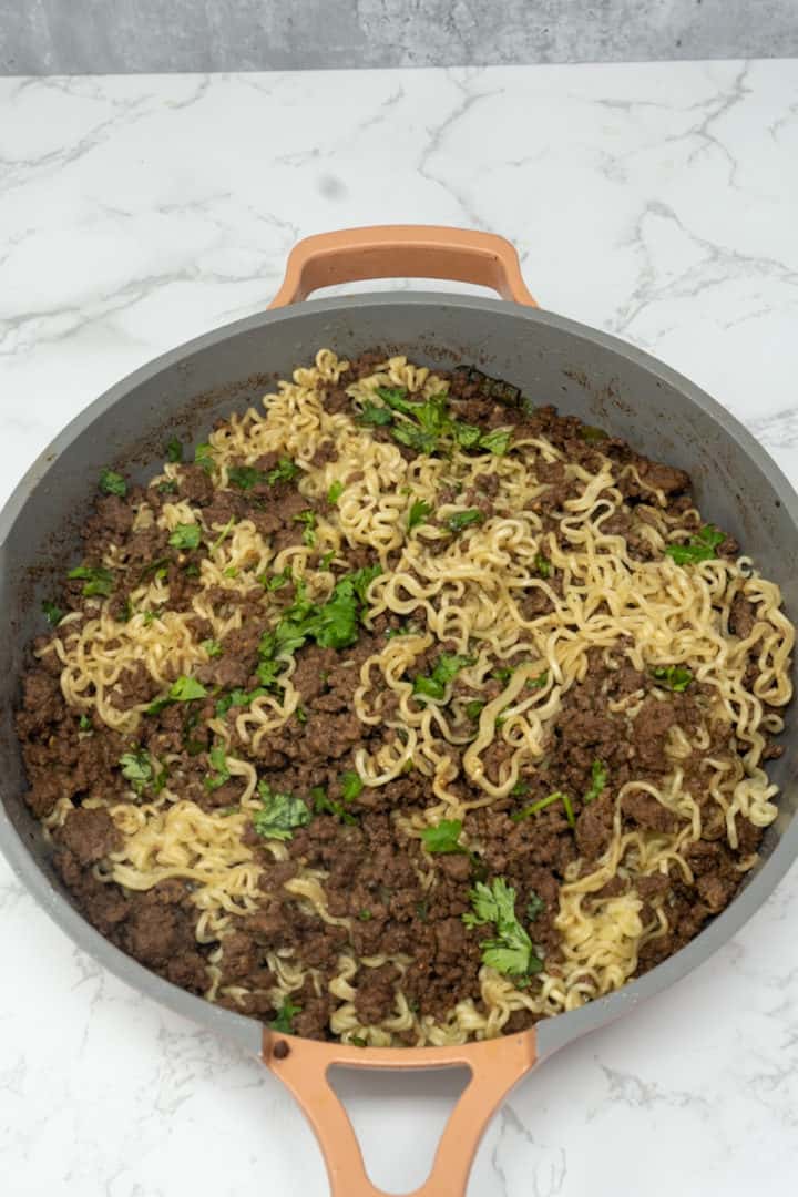 These Ground Beef Ramen is made with ramen, ground beef, soy sauce, sesame oil, sriracha, jalapeños, lime juice, and cilantro.