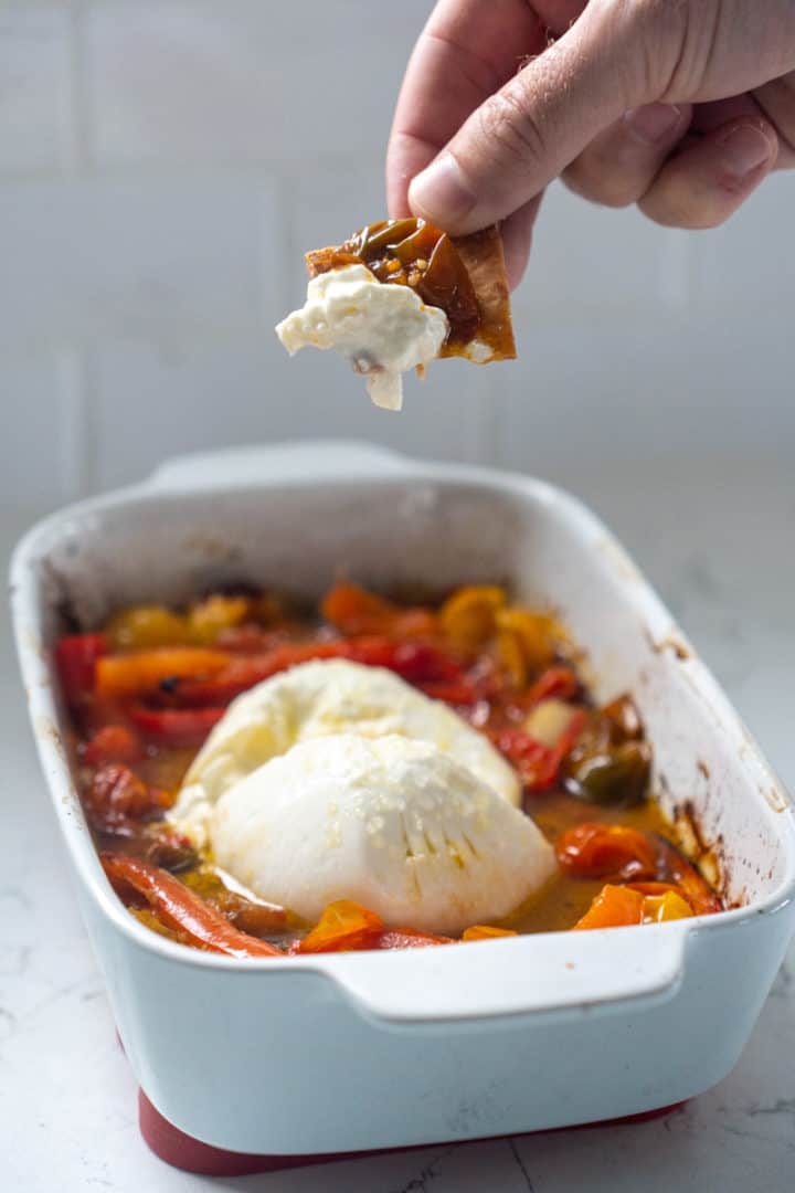 Serve with crackers or toasted bread and enjoy this Roasted Peppers Burrata Appetizer Recipe.
