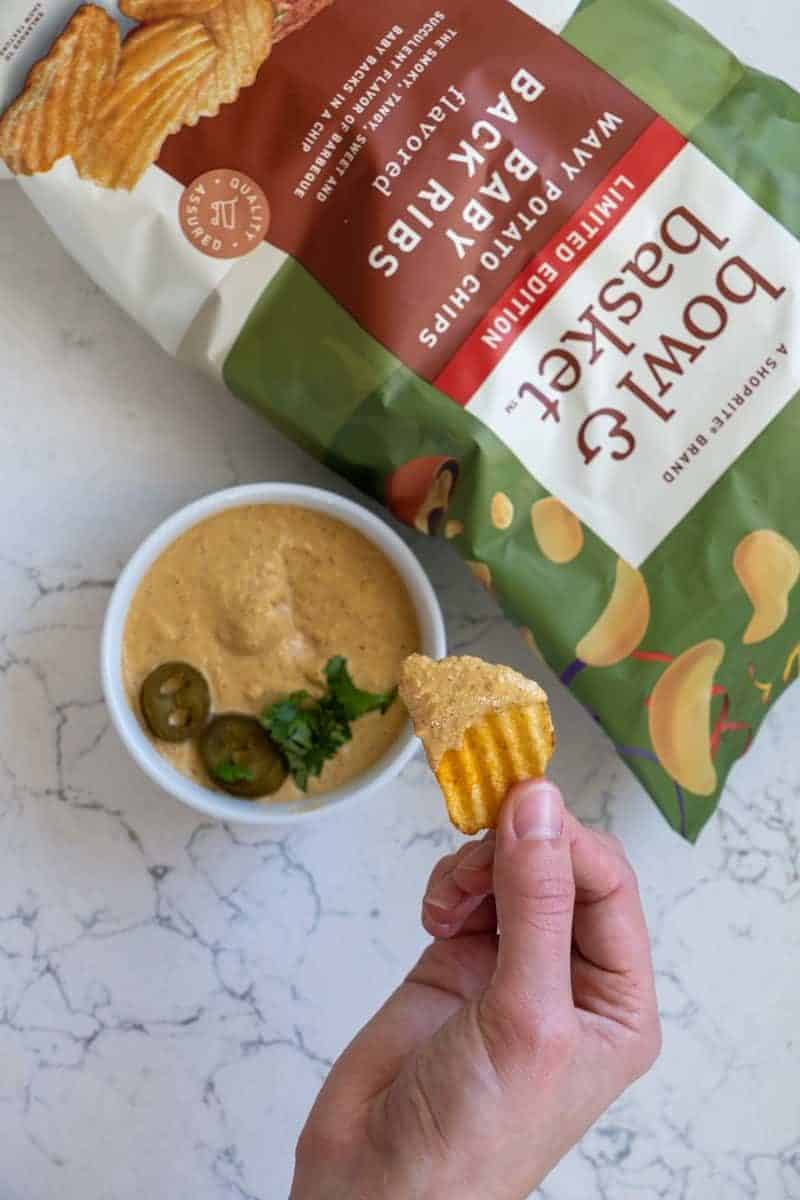 This Vegan Cheese Dip is made with cashews, garlic, nutritional yeast, chipotle peppers, chili powder, paprika, and blended with hot water.