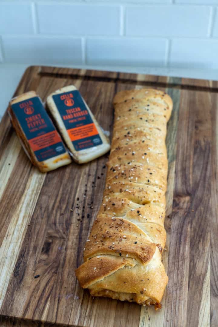 This Cheesy Jalapeño Braided Pastry Recipe is made with puff pastry, fontal cheese, pickled jalapeños, butter, and baked to perfection.