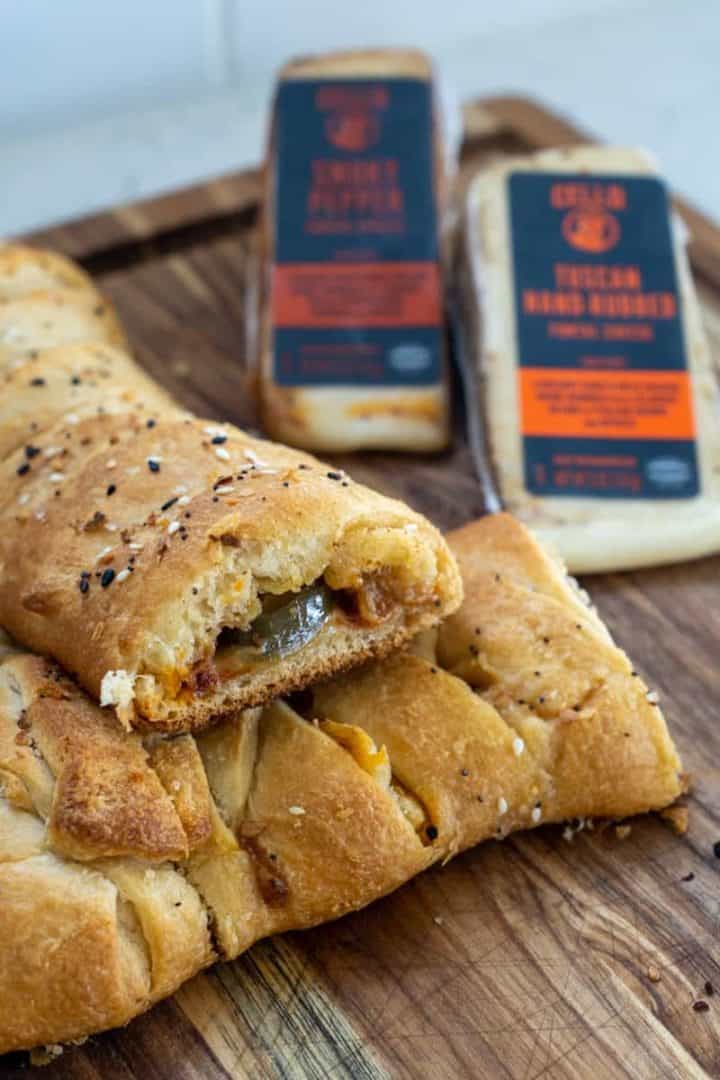 This Cheesy Jalapeño Braided Pastry Recipe is made with puff pastry, fontal cheese, pickled jalapeños, butter, and baked to perfection.