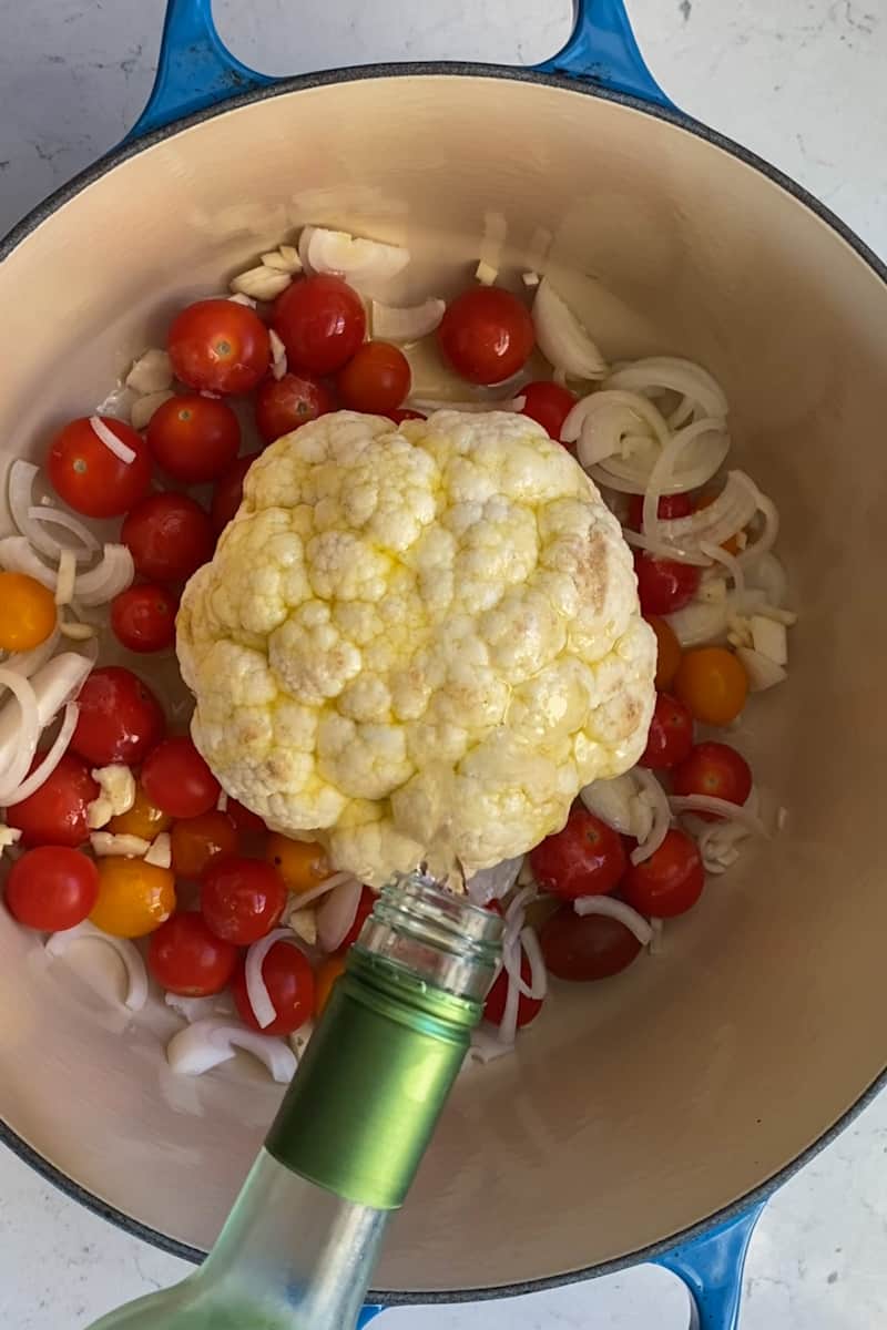 Add the cauliflower, covered, in the oven and cook until tender when pierced with a knife, around 45 minutes. When cauliflower is tender, remove from the oven.