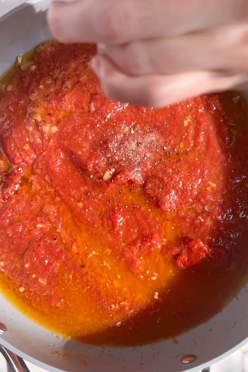 Add the vodka and simmer for about 3 minutes, or until ⅓ of the vodka has reduced. Add the tomatoes and sun-dried tomatoes. Sprinkle salt and pepper and simmer sauce over medium heat for about 10-15 minutes. 