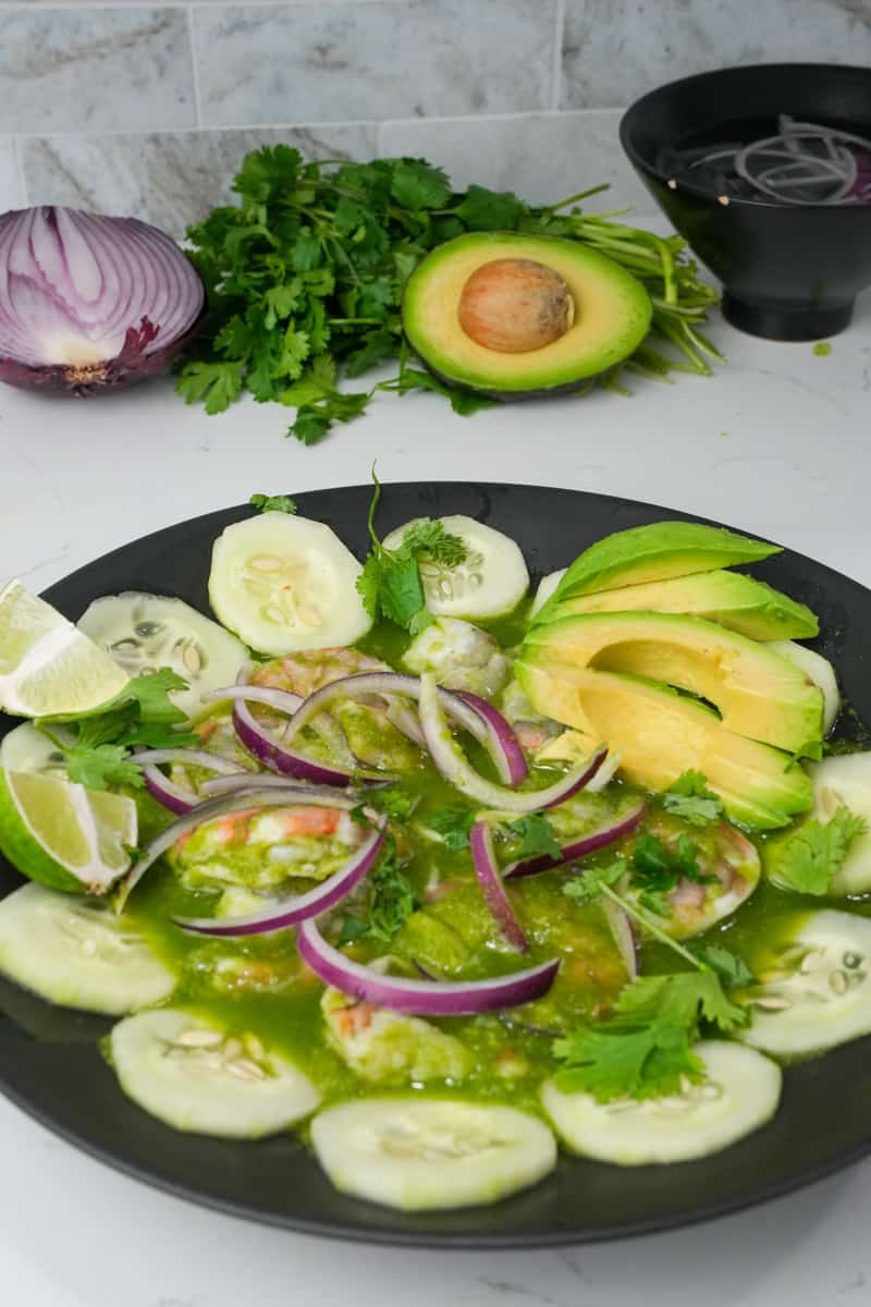 This Shrimp Aguachile Recipe (Aguachile de Camarón) is made with jalapeños, limes, cilantro, shrimp, cucumber and onion.