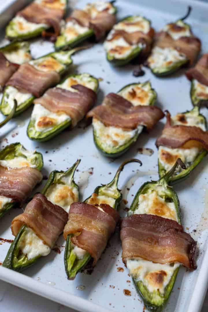 These Jalapeño Poppers with Cheddar Cheese (Air Fryer and Oven) are made with jalapeños, cream cheese, sharp cheddar cheese, bacon and air fried to crispy goodness.