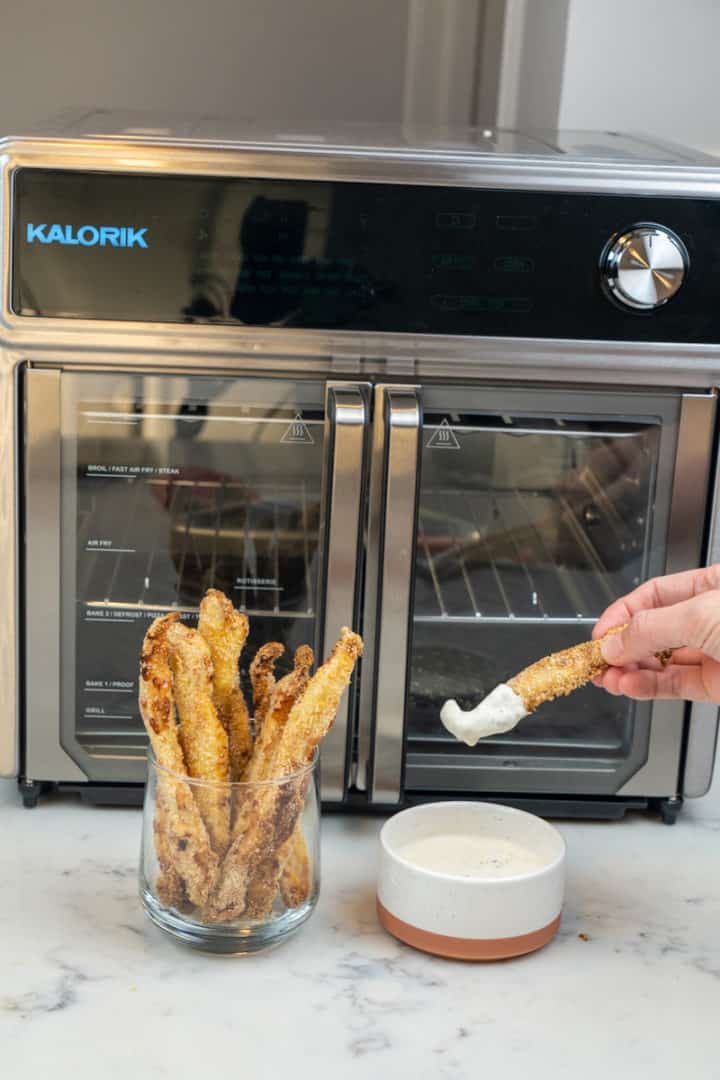 This Homemade Air Fryer Chicken Fries Recipe is made with panko crumbs, flour, parmesan, garlic powder, eggs and air fried to perfection. 