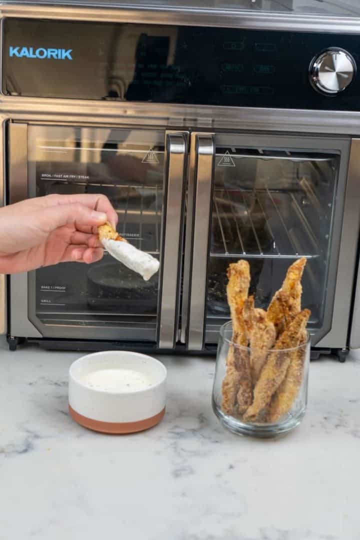 These Chicken Fries in Air Fryer are made with panko crumbs, flour, parmesan, garlic powder, eggs, and are air fried to perfection.