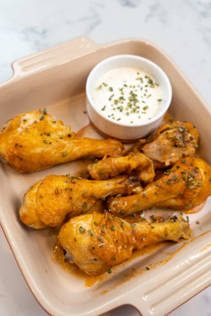 These Air Fryer Buffalo Drumsticks are made with chicken drumsticks, baking powder, garlic powder, onion powder, and buffalo sauce.