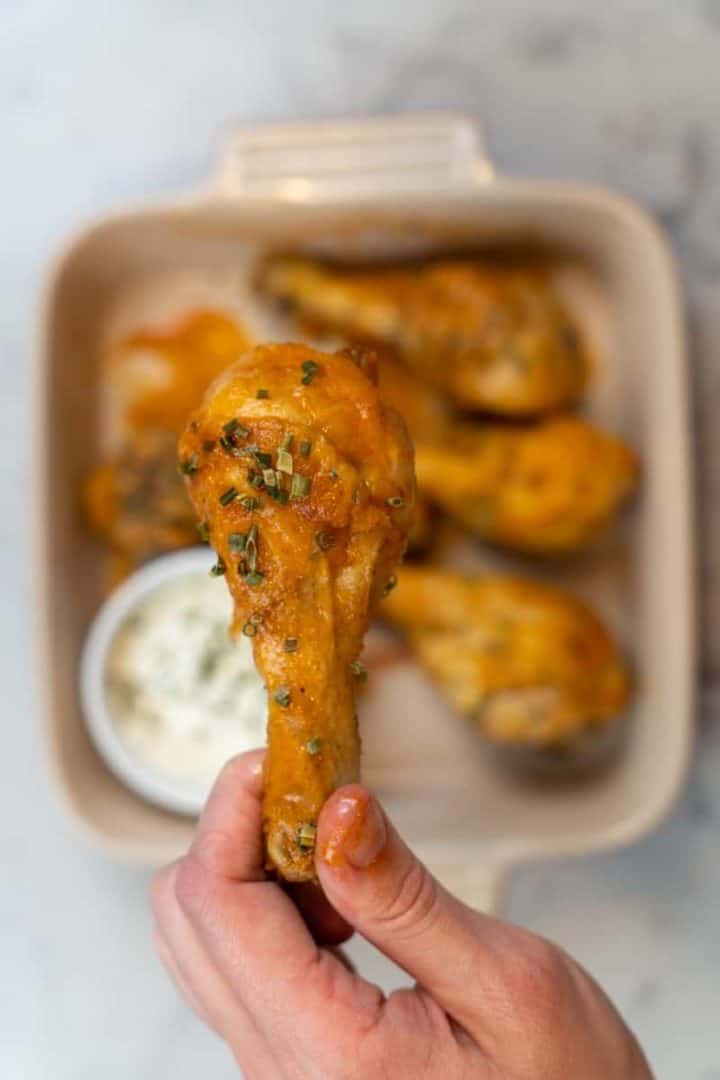 These Air Fryer Buffalo Drumsticks are made with chicken drumsticks, baking powder, garlic powder, onion powder, and buffalo sauce.
