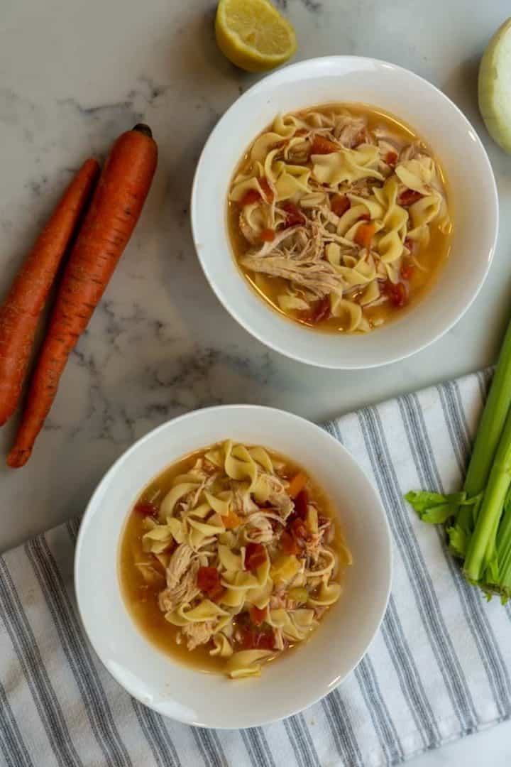 This Copycat Panera Chicken Noodle Soup is made with chicken, carrots, celery, onion, garlic, broth, wide egg noodles as well as lemon juice.