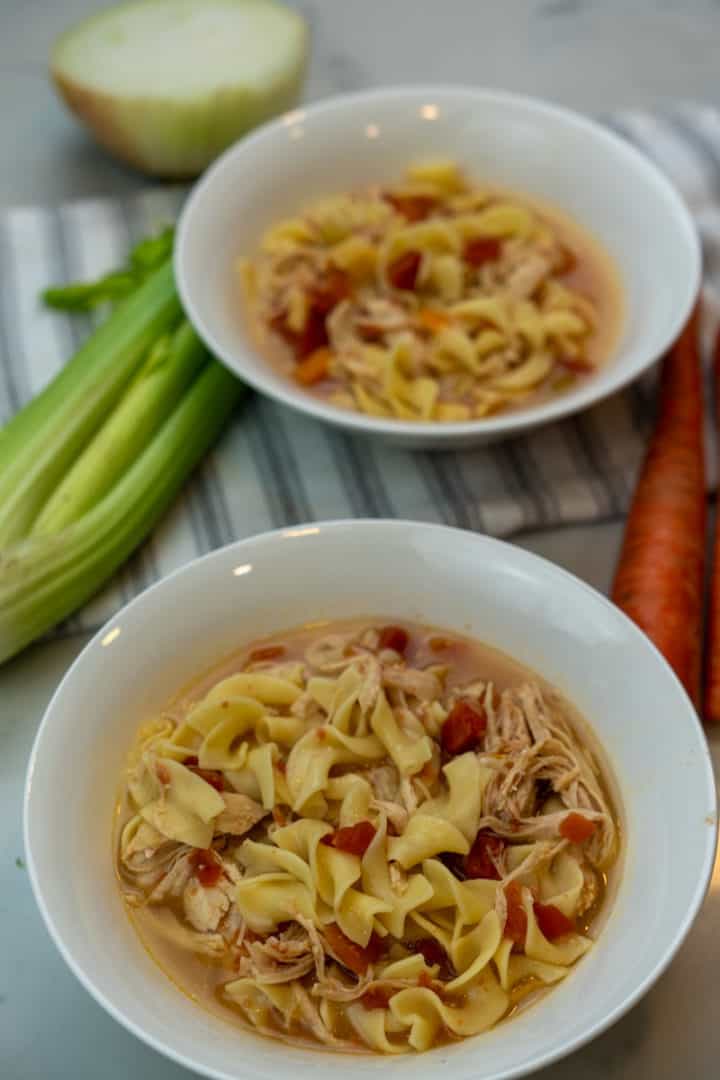 This Copycat Panera Chicken Noodle Soup is made with chicken, carrots, celery, onion, garlic, broth, wide egg noodles as well as lemon juice.