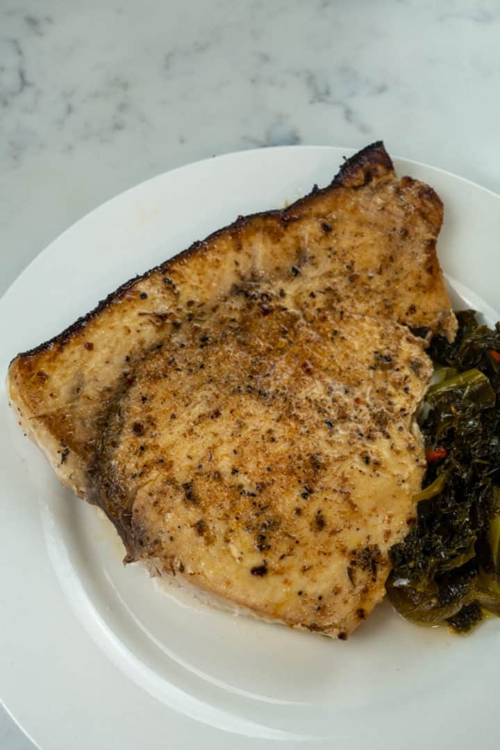 These Blackened Broiled Cajun Swordfish are made with swordfish steaks, salt, pepper, Cajun seasoning, a greased baking sheet, and broiled to perfection.