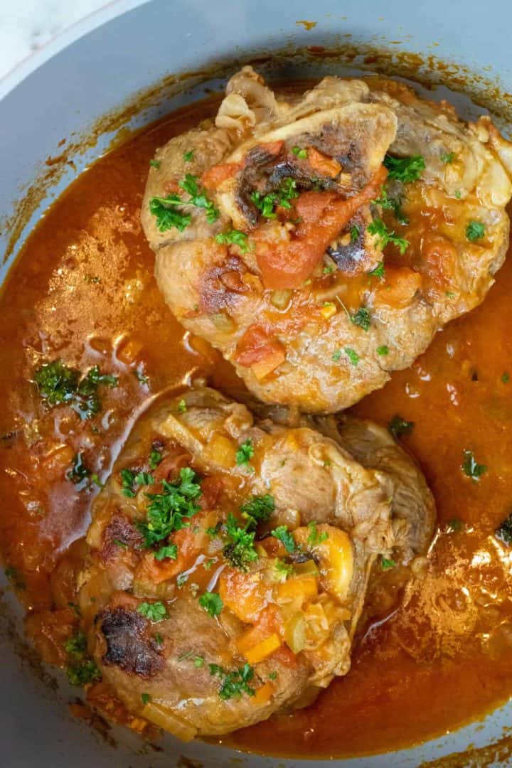 This Osso Buco alla Milanese is made with veal shanks, carrots, celery, onions, tomatoes, white wine, broth, thyme and is braised to perfection.