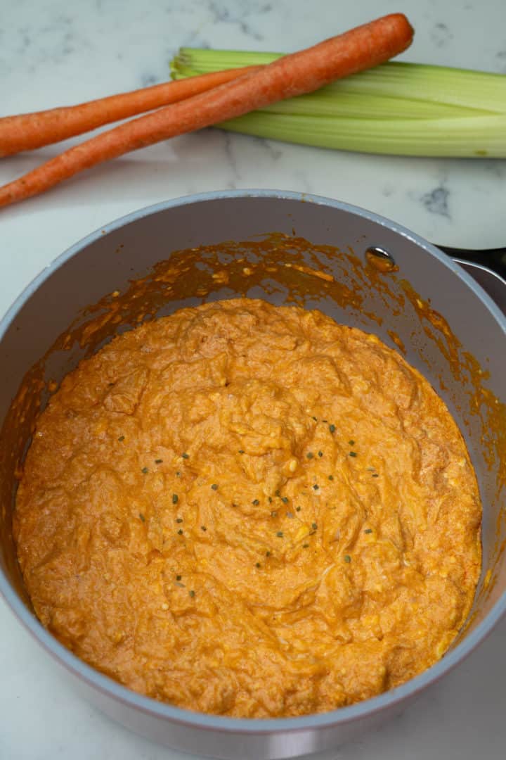 This Buffalo Chicken Dip without Ranch (Keto) only needs four ingredients: shredded chicken, cream cheese, hot sauce and butter.