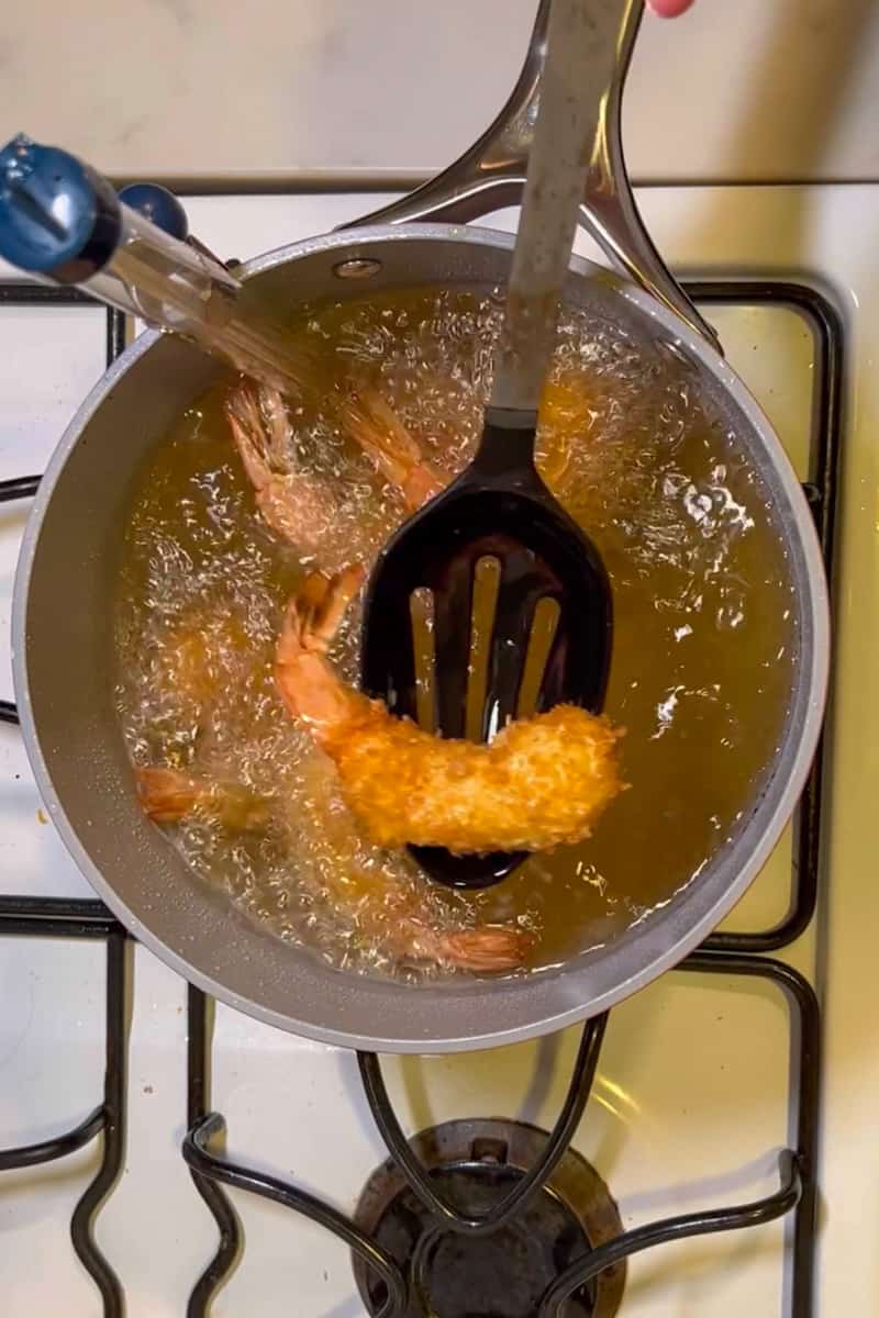 When the oil is hot enough (around 375°F), deep fry the shrimp until golden brown, about 2-3 minutes. You may need to do this in batches. 