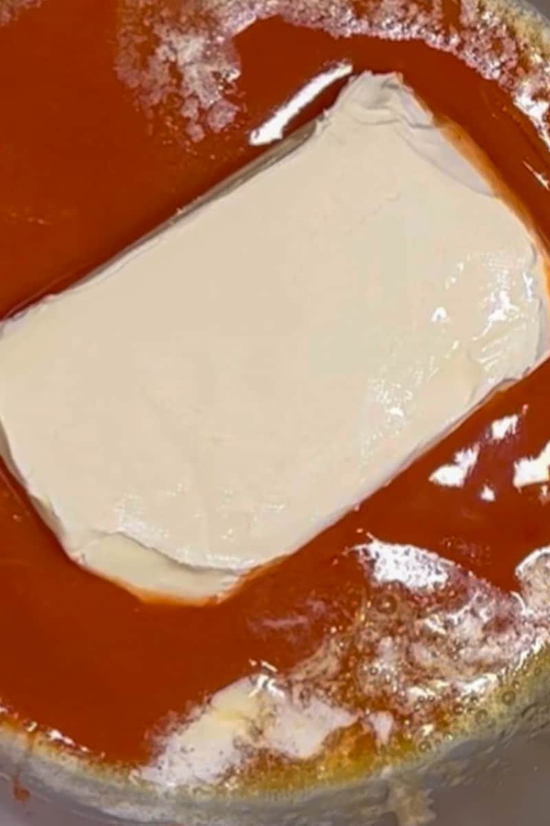 Add the hot sauce and cream cheese and keep stirring, until the cream cheese melts, about 5-8 minutes.