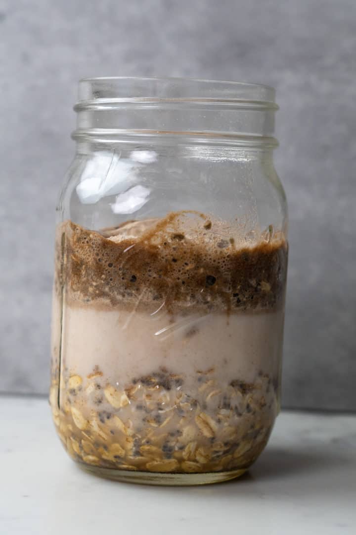 Mix oats, chia seeds, milk, protein powder and salt in a mason jar or container with airtight sealable container.