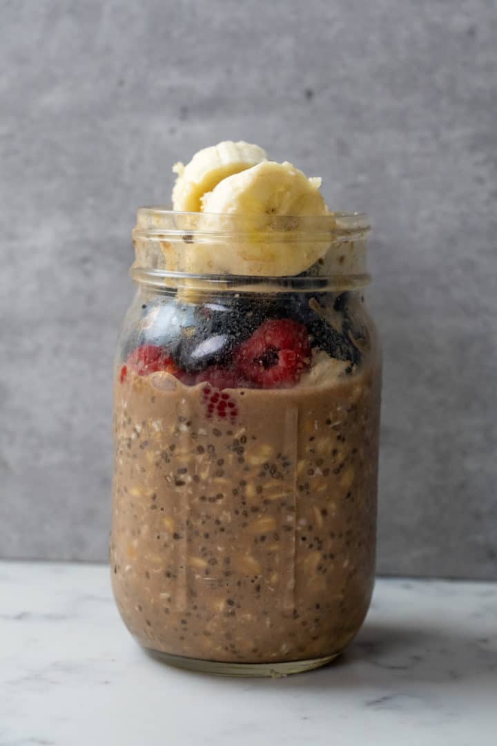Top with the berries, nuts and/or almond butter.  Enjoy this Overnight Oats Recipe.