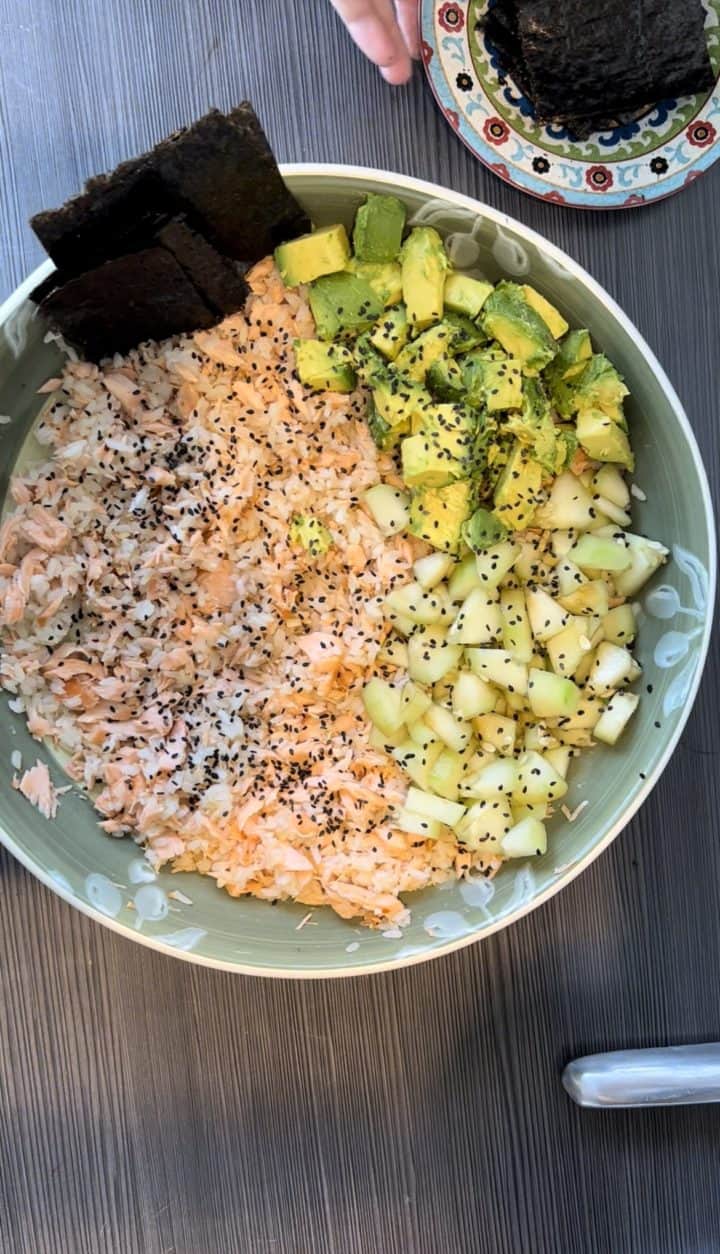 I gave this a little spin of my own, baking the salmon in a ginger, garlic, soy sauce, rice vinegar and sesame mixture. Enjoy this Tiktok Salmon Rice Bowl Recipe.