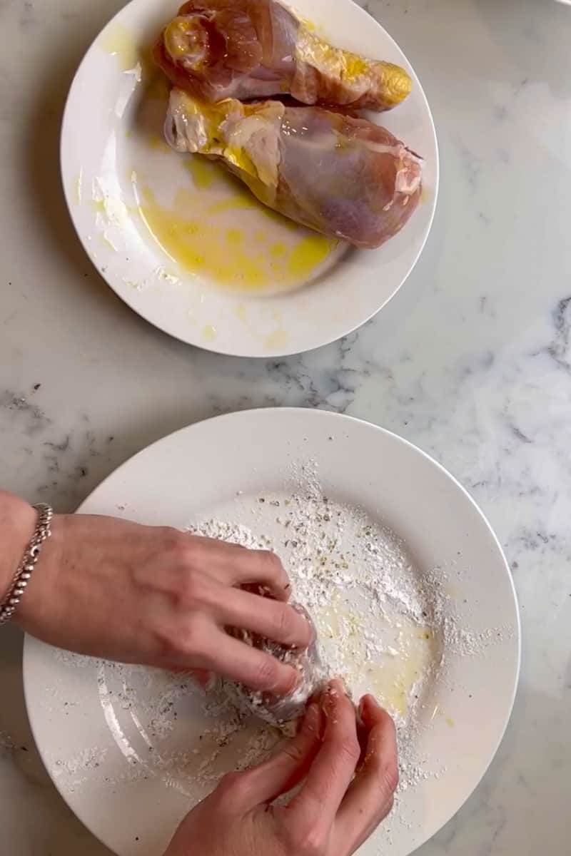 Preheat the air fryer to 380°F. To make Air Fried chicken legs start by patting the chicken dry with a paper towel. Add the chicken in a bowl and add the olive oil over them, until combined.