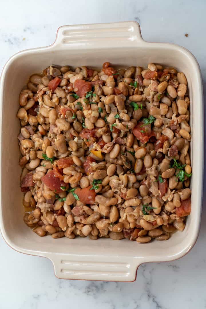 These Frijoles Charros Mexicanos (Mexican Charro Beans) are made with dried pinto beans, broth, onion, garlic, diced tomatoes, cilantro and are so rich in smoky flavor. 