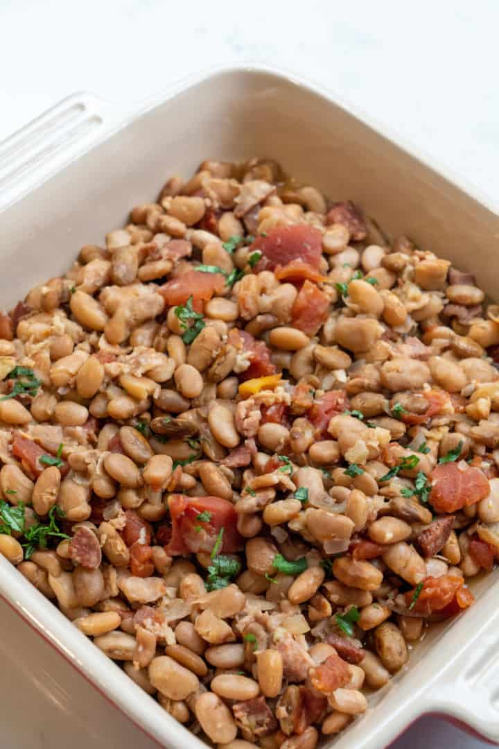 These Frijoles Charros Receta are made with dried pinto beans, broth, onion, garlic, diced tomatoes, cilantro and are so rich in smoky flavor. 