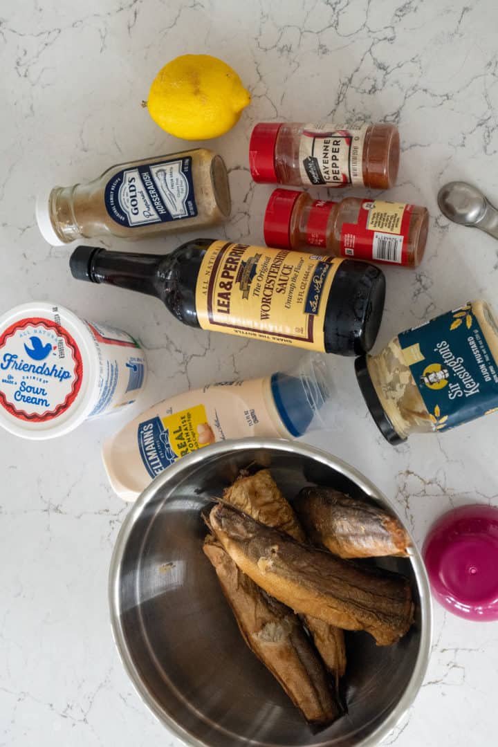 How to Make Smoked Fish Dip is easy- You will need smoked whitefish, mayo, sour cream, horseradish, Worcestershire, mustard and spices.