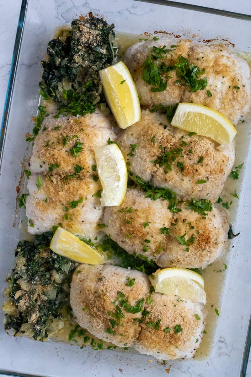 This Baked Flounder Florentine is made with flounder, olive oil, onion, spinach, bread crumbs, white wine and parsley.